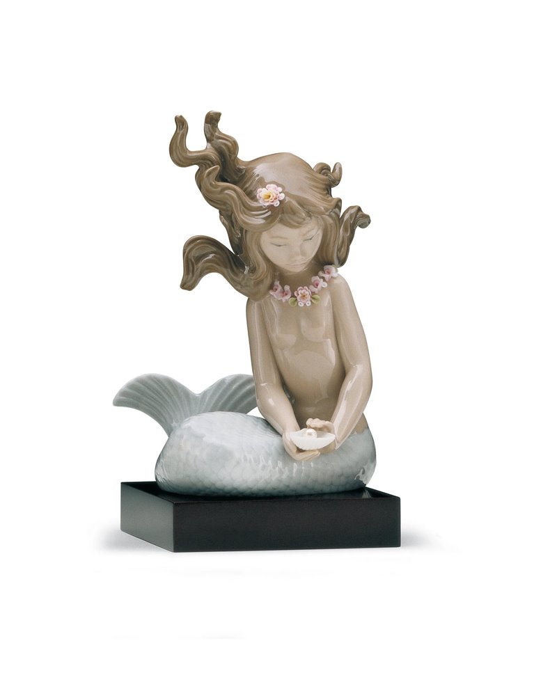 Sirena con brazos al costado Sirena con brazos al costado